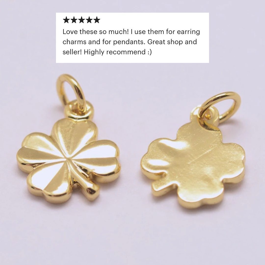 Picture of two clover charms against a lilac background with a 5 star review tag.
